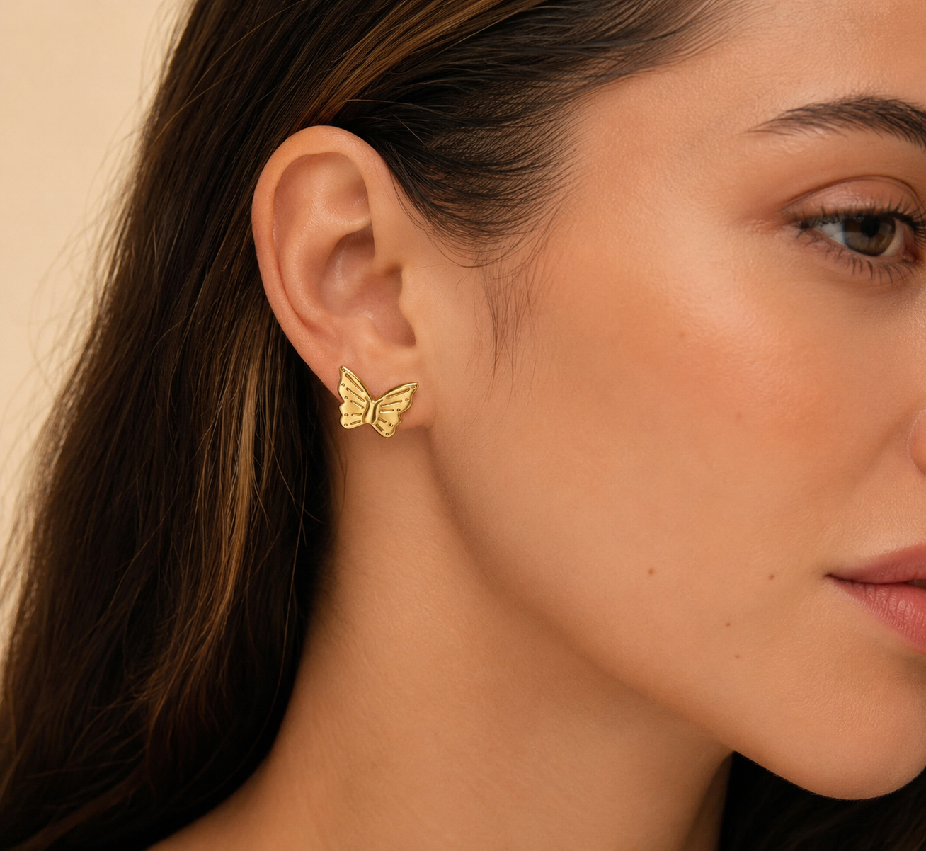 Wearing G23 gold earrings